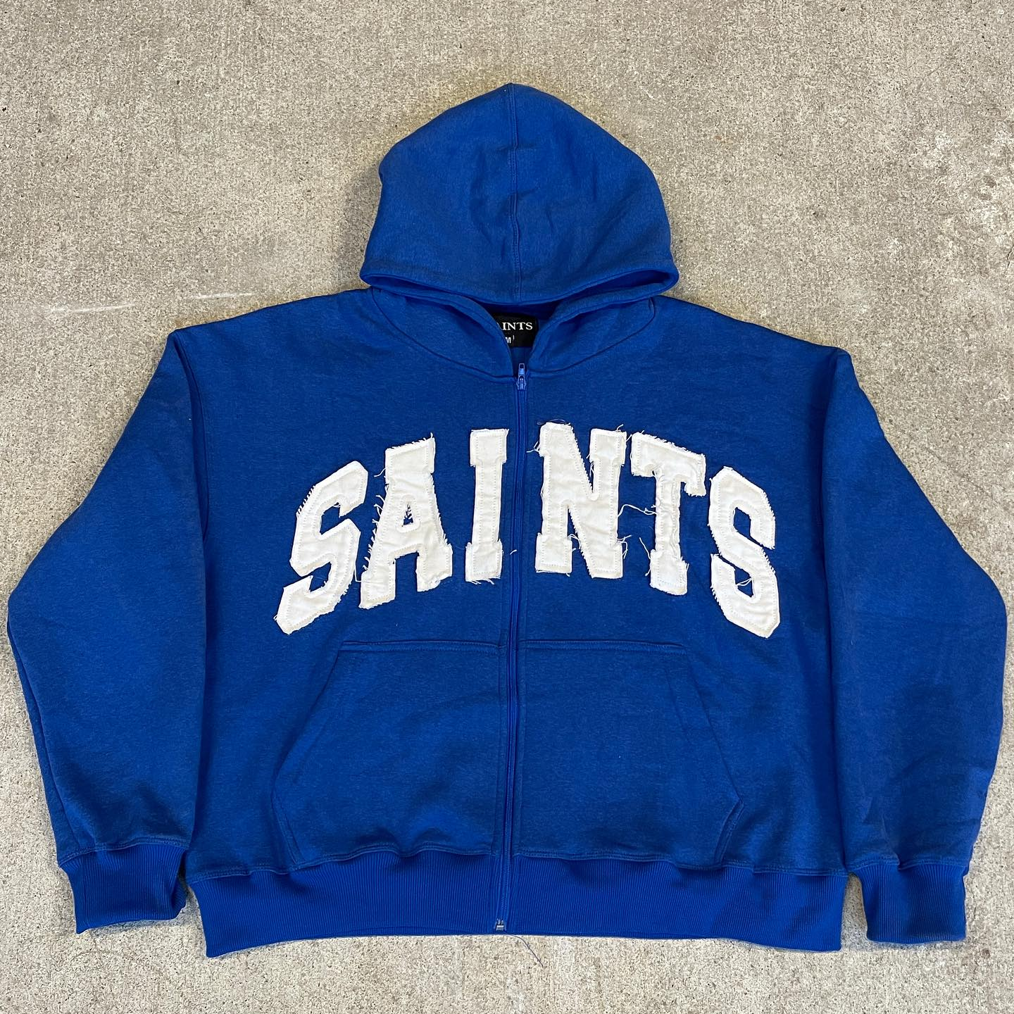 saints patch zip-up hoodie