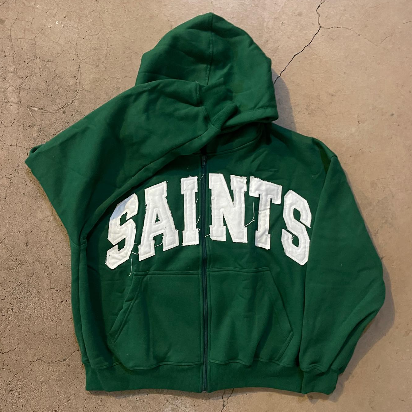 saints patch zip-up hoodie