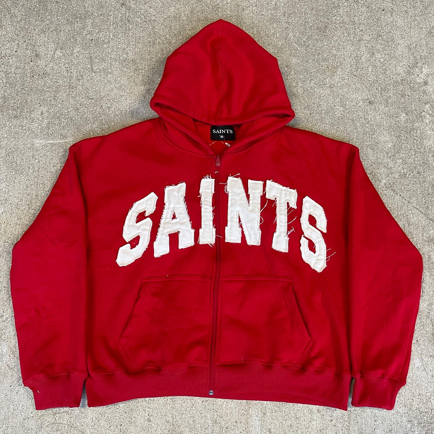 saints patch zip-up hoodie