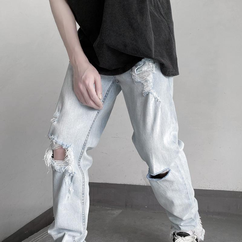 High street trend raw edge ripped jeans male ins tide thin section thin denim trousers